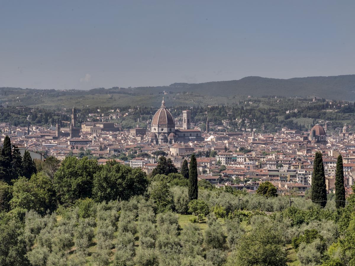 Camera Tripla con Vista Città